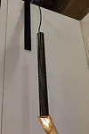 A collaboration between 12th Avenue Iron and Olson Kundig Architects, The Tom Kundig Collection presented several new hardware designs, including a perforated steel tube light pendant, a door pull fab