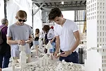 Visitors add their own LEGO creations to the Eliasson work.