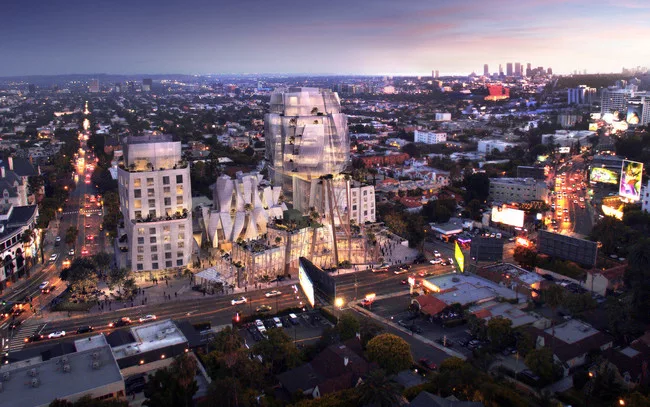 As shown in this architectural model, two towers, on the east and west ends of the site, will contain apartments and condominiums, while two buildings facing Sunset Boulevard will contain restaurants,