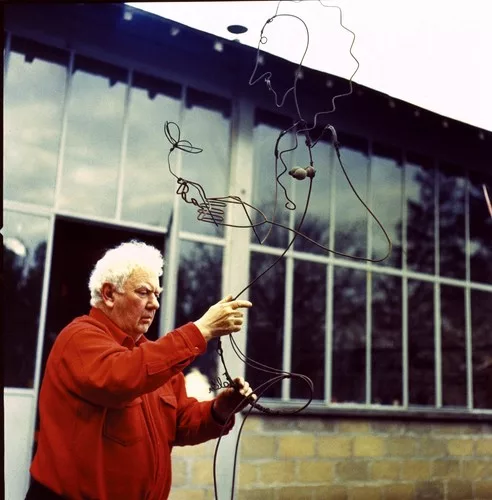 Sculptor Alexander Calder at work in Sache, France, 1964, photographed by Pedro E. Guerrero.
