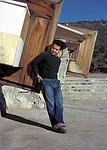Pedro E. Guerrero, age 22, at Taliesin West, architect Frank Lloyd Wright's home.