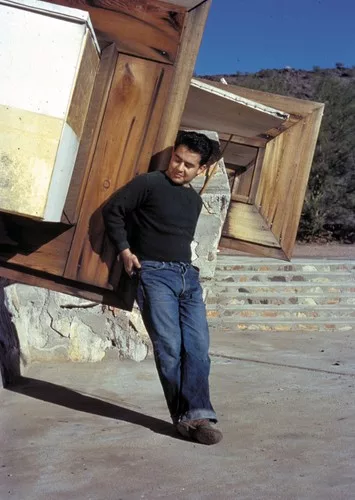 Pedro E. Guerrero, age 22, at Taliesin West, architect Frank Lloyd Wright's home.