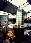 Frank Lloyd Wright at the “Sixty Years of Living Architecture” exhibit on the site of the future Guggenheim Museum, 1953, photographed by Pedro E. Guerrero.
