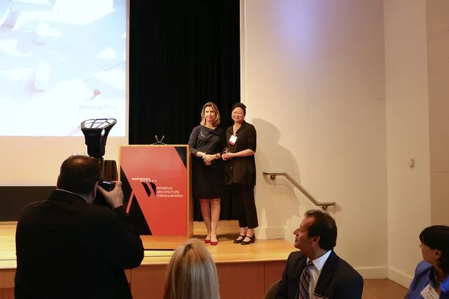 RECORD editor-in-chief Cathleen McGuigan bestowing the New Generation Leader Award to Meejin Yoon.<div id='_mcePaste'>﻿﻿