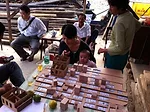 Villagers with a model of the Shijia prototype.