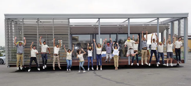 The winning team from the Stevens Institute of Technology with its Sure House.