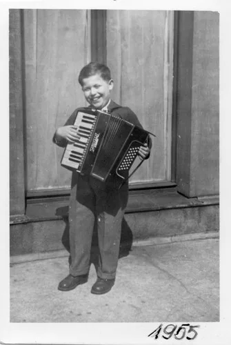 A young Daniel Libeskind with an accordion.