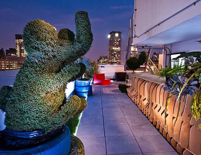 Brooks Atwood, of POD Design + Media, and Daniel Perlin, of Perlin Studios, conceived the rooftop inspired by <i>United States of Tara</i>'a show about a housewife with multiple personalities. Landsca
