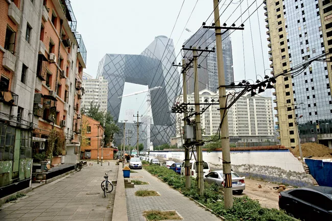 OMA reimagined the skyscraper with its CCTV project in Beijing, bending the tower into a two-legged structure connected at the top.