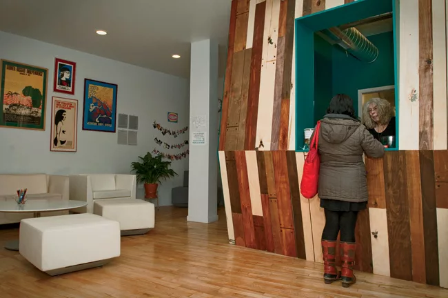 For the new home of a women’s health clinic, the firm used the ‘70s wood paneling from its former facility for a reception area.