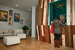 For the new home of a women’s health clinic, the firm used the ‘70s wood paneling from its former facility for a reception area.