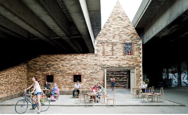 An early project, Folly for a Flyover, is a performance space beneath a highway overpass. 