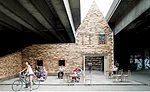 An early project, Folly for a Flyover, is a performance space beneath a highway overpass. 