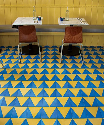 Los Angeles–based architect Barbara Bestor of Bestor Architecture selected Granada Tile cement tile for the floor of the new Beachwood Cafe in Hollywood. Granada's 8”-square Khufu 