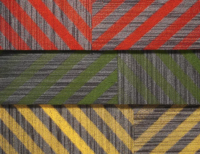 Urban art makes its way into commercial interiors via Mohawk Group's Street Thread collection of four color-injecting designs by popular street artists Aakash Nihalani and Queen Andrea. The fo
