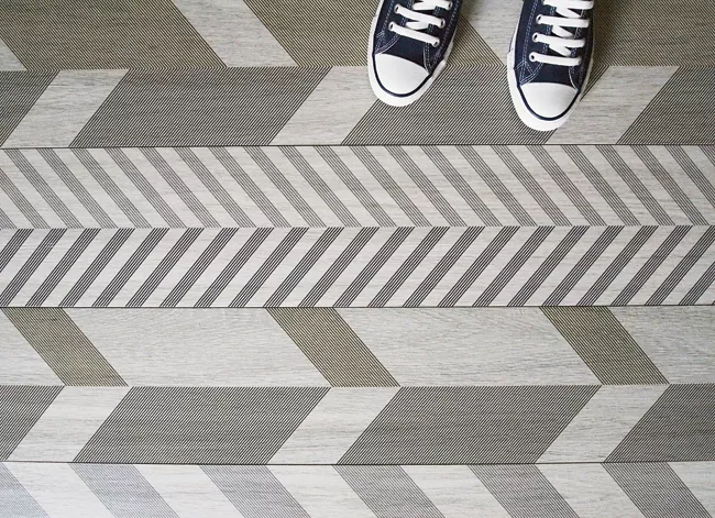 Milan-based architect Diego Grandi puts an urban spin on this faux-bois porcelain tile line. Called Type-32, the collection consists of large-format planks—up to 118” long—with two l