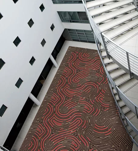 Part of Milliken's new Identity One modular carpet collection, Latent replicates the curvilinear patterns of the human fingerprint. Specifiers can play with the scale, color palette, sequence, and tex