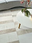 Crossville's first digitally produced line, Reclamation, is a collection of porcelain tiles that feature patterns and textures inspired by reclaimed materials, which continue to be popular design elem