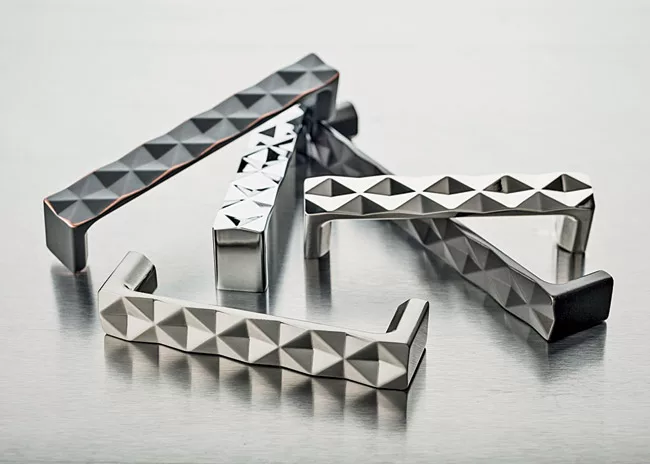 Top Knobs has recently added an edgy, dimensional kitchen-cabinet hardware style to its Mercer Collection—the Quilted Series.  With a pattern that complements both traditional and contemporary d