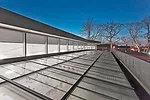 The Mariners Harbor Library (shown) on Staten Island, New York, gets ample natural reading light without the discomfort of solar heat gain, courtesy of Okasolar S. The system diffuses daylight using f