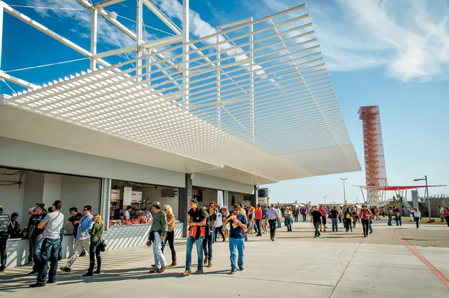 When it’s time for a snack, they can join the other spectators at one of the many concession stands in the Grand Plaza, where the modular structures were purposely designed to face the lawn rath