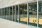 The subterranean gym, which is 32 feet from floor to ceiling, can be turned into an auditorium to seat 1,200.