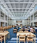 The new media center occupies a space at the school's core that was once a gloomy and low-ceilinged cafeteria.