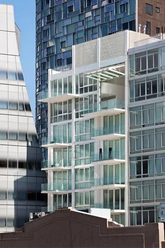 A view of Ban's Metal Shutter Houses' shutterless south side reveals Frank Gehry's IAC building (left) and apartments by Jean Nouvel (rear) and Annabelle Selldorf (right).