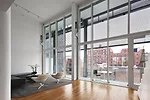 Appearing like a traditional curtain wall, the expansive thermal bifold doors open fully, blurring the line between indoors and out.