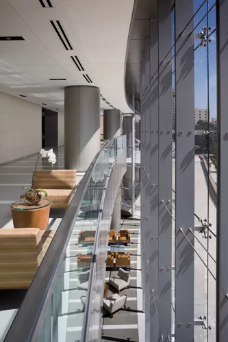 The double-height lobby looks out to Bertner Avenue and draws the outside world into the facility's 232-seat state-of-the art auditorium, boardroom, and pre-function space.