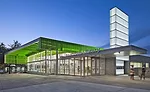 On the main entrance plaza, the Freelon Group gave the District of Columbia's Anacostia Library a 17-foot-high glass curtain wall shielded by a perforated metal canopy; its function is highly legible