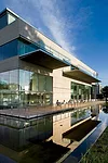 A limestone rainscreen alternates with glass on the west facade, where the caf' and restaurant overlook the sculpture garden.