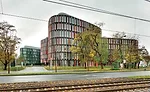 The Ufer House (foreground) complements its leafy surroundings.