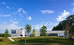 CAPA's entrance is marked by the Lens, on the left, a meditative space with a manual oculus.