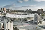 Kiev's Olympic Stadium is surrounded by raised terraces, a plaza to the west with a garage below, and a recently landscaped park. The lobby of an adjacent hotel serves as the stadium's VIP entrance.