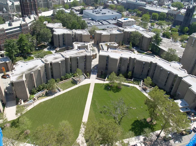 Today’s crescent courtyard closely resembles the 1962 original. However, the moatlike edges have been rebuilt to include skylights that illuminate the activity areas extending under the lawn.