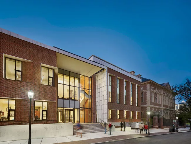 The roofline of Golkin Hall steps down in height from its historic neighbor Silverman Hall.