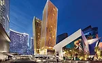 The tilt of the Veer condominium towers (center of photo) is emphasized by LED fixtures mounted on the corner of the buildings' shading devices. To ensure the longevity of LEDs in the hot desert clima
