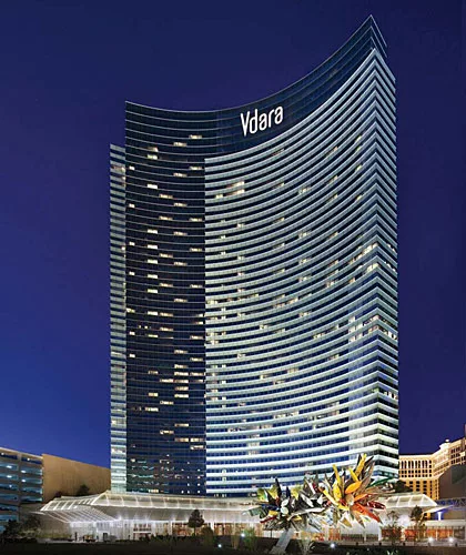 With 3000K metal-halide spotlights placed on a pool deck and podium, designers lit the facades of the Vdara Hotel to accentuate recessed spandrel panels. A variety of warmer sources were used to illum