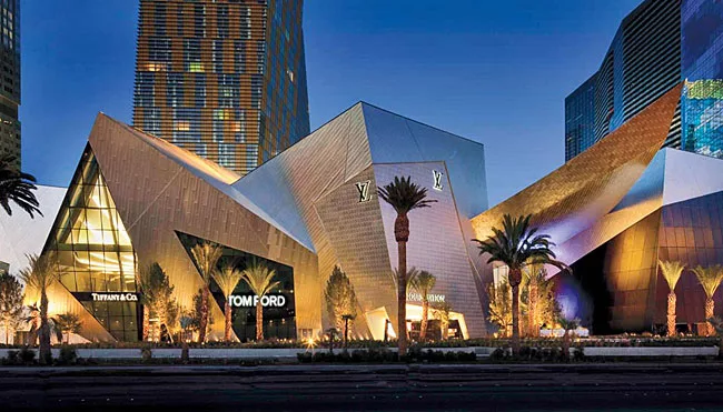 The facade of CityCenter's retail center, the Daniel Libeskind'designed Crystals, is illuminated with a combination of low-wattage footlights located directly at the building's base and higher-wattage