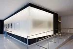 5s installed behind a base of frosted glass panels illuminate the box office.