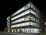 Opening onto a campus square (under construction), the ground level of Fumihiko Maki&rsquo;s Square 3 office building features warm tones to provide a natural transition from the future green space ou