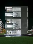 Luminous in its simplicity and materiality, the building radiates a gentle glow from within. There are no outdoor lighting fixtures directed at the glazed structure, and the light inside, generated fr