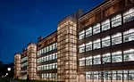 Architects Hopkins and Payette devised fixed aluminum shading devices for the laboratory wing's east-facing curtain wall to mitigate heat gain and glare.
