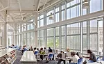 As a decorative note, architects Davis Brody Bond and the lighting designers at MCLA installed industrial-style pendants outfitted with compact fluorescent lamps in the daylight-filled reading room. O