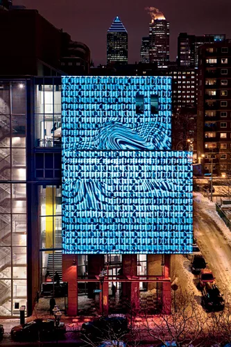 Emmanuel Mauriés-Rinfret devised a dynamic video program for the facade of the circa-1995 Université du Québec ' Montréal (UQAM) Design Center.