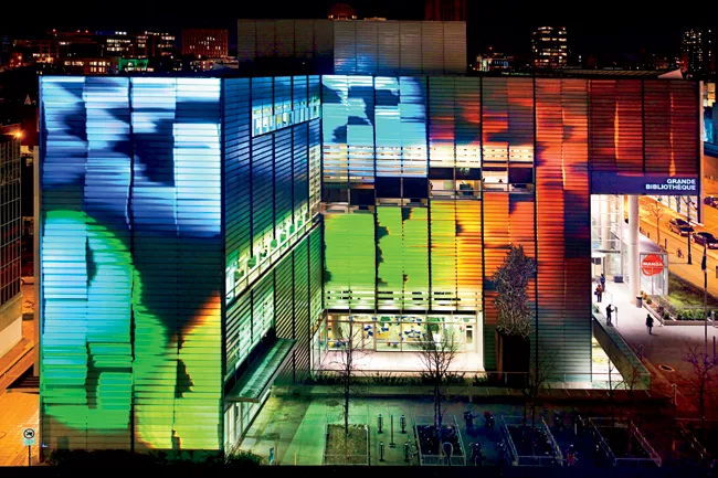 Bernard Duquay created an animated video that wraps the aluminum and glass facade of the Grande Bibliothéque, circa 2004.