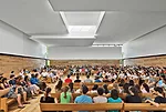 Inspired by Quaker teachings, the architects created a meeting house space for Sidwell Friends School, infusing it with silence and light by buffering outside noise and direct sunlight with a series o