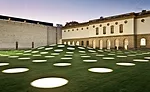 The underground structure spans the 249-by-174-foot garden with a green roof and 195 skylights that illuminate the landscape and gallery below. But more than the roof is green. The building has effici