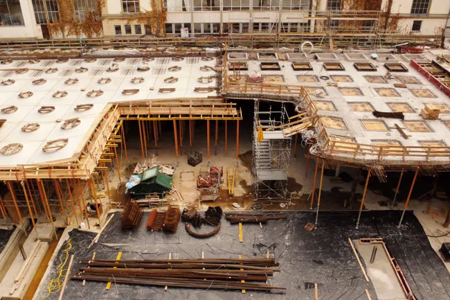 Concrete was poured in place over the ceiling panels for the green roof